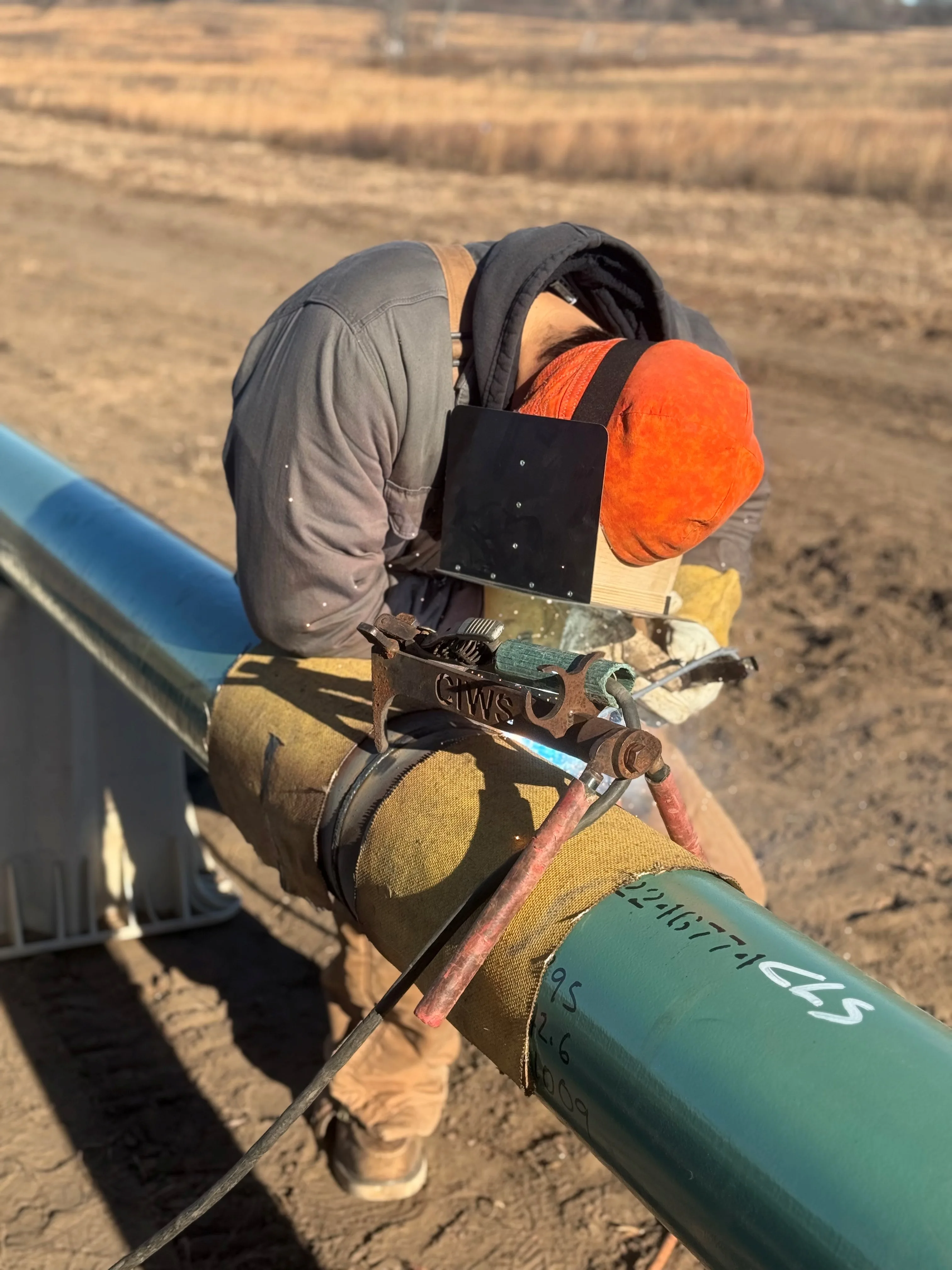 Pipeline Welder at Work